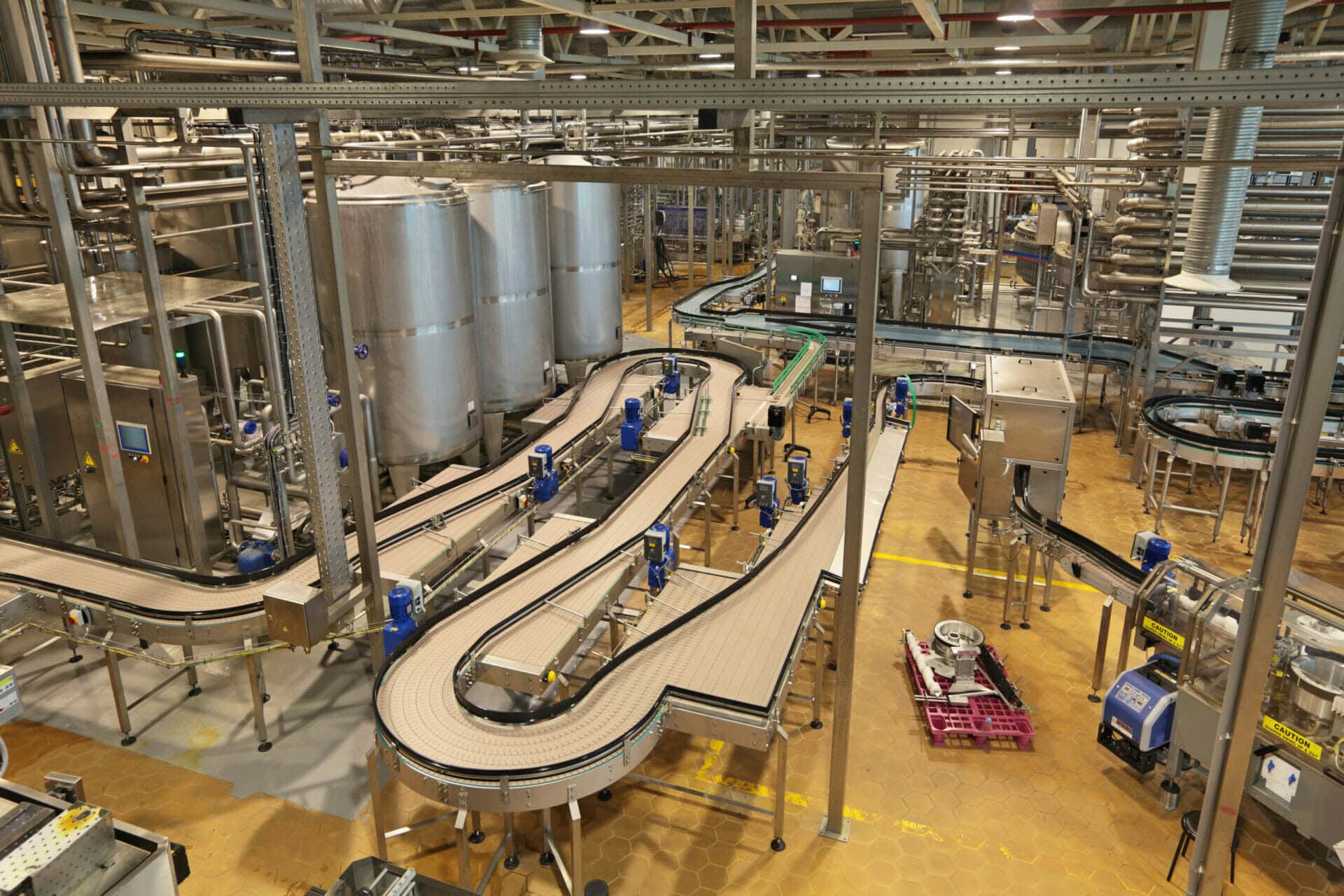 The interior of the brewery. The conveyor line for bottling of beer